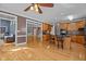 Spacious open-concept kitchen and dining area with hardwood floors and oak cabinetry at 133 Aleah Ct, Clayton, NC 27520