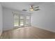 Large room with French Doors and updated laminate flooring at 133 Aleah Ct, Clayton, NC 27520