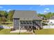 Back exterior view showcasing the home's architecture and rear yard at 133 Aleah Ct, Clayton, NC 27520