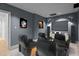 Home theater room with plush recliners and a large screen, perfect for entertainment at 133 Aleah Ct, Clayton, NC 27520