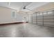 Spacious garage with ample room for parking, storage and a side entry door at 140 Adams Pointe Ct Ct, Angier, NC 27501