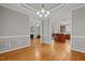 Open-concept space with fireplace, hardwood floors, and seamless transitions to the kitchen at 140 Adams Pointe Ct Ct, Angier, NC 27501