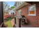 Back porch with a grill and views of the backyard, extending the living space outdoors for relaxation at 1403 Vickers Ave, Durham, NC 27707