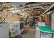Unfinished basement storage space with exposed brick and ample room for organization at 1403 Vickers Ave, Durham, NC 27707