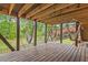 Inviting backyard deck with multiple hammocks overlooking the lush garden at 1403 Vickers Ave, Durham, NC 27707