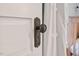 Close-up of a vintage door with antique doorknob, showing the charm and detail of the home's design at 1403 Vickers Ave, Durham, NC 27707