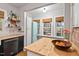 Charming kitchen featuring butcher block countertops, a retro fridge, and natural light at 1403 Vickers Ave, Durham, NC 27707