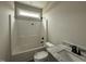 Clean bathroom featuring shower/tub combination and granite vanity top at 152 Royal Ave, Selma, NC 27576