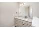 Well-lit bathroom featuring granite countertops and modern fixtures at 152 Royal Ave, Selma, NC 27576