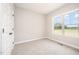 Bright bedroom with large window providing natural light and scenic view at 152 Royal Ave, Selma, NC 27576