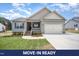 Charming one-story home features a welcoming porch and attached two-car garage at 152 Royal Ave, Selma, NC 27576