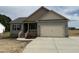 Charming single-story home featuring a two-car garage and inviting front porch at 152 Royal Ave, Selma, NC 27576
