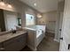 Main bathroom featuring a soaking tub, dual vanities, and modern fixtures at 152 Royal Ave, Selma, NC 27576