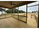 Spacious screened-in porch with wood flooring, overlooking the backyard at 152 Royal Ave, Selma, NC 27576