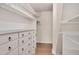 Walk-in closet featuring custom drawers, shelving, and a bright interior at 1602 Lake Shore Dr, Dunn, NC 28334