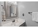 Bathroom with a framed mirror, single vanity and attractive fixtures at 1604 Cane Creek Dr, Garner, NC 27529