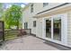 Inviting outdoor deck with sliding glass doors, providing seamless access to the home and backyard at 1604 Cane Creek Dr, Garner, NC 27529