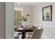 Inviting dining room with stylish decor and lots of natural light at 1604 Cane Creek Dr, Garner, NC 27529