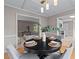 Inviting dining room with hardwood floors and views into other living spaces at 1604 Cane Creek Dr, Garner, NC 27529