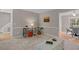 Inviting living room featuring plush carpeting and an open doorway to the dining area at 1604 Cane Creek Dr, Garner, NC 27529