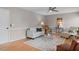 Cozy living room featuring stylish decor and hardwood floors at 1604 Cane Creek Dr, Garner, NC 27529