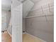 A roomy storage area with wire shelving and a tile floor at 1604 Cane Creek Dr, Garner, NC 27529