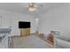 View of Bedroom with hardwood floors, crib, and changing table at 1623 Alicary Ct, Cary, NC 27511