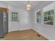 An eat-in dining area features natural light and neutral color palette at 1623 Alicary Ct, Cary, NC 27511