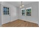 A bright dining area with natural light shining through the windows and white trim at 1623 Alicary Ct, Cary, NC 27511
