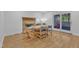 Light and bright dining room with stone fireplace and french doors to the exterior at 1623 Alicary Ct, Cary, NC 27511