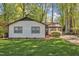 Inviting home with a manicured lawn, a simple landscape design and a neutral color palette at 1623 Alicary Ct, Cary, NC 27511