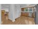 Bright kitchen featuring wooden cabinets, stainless steel appliances, and view into the living room at 1623 Alicary Ct, Cary, NC 27511