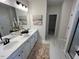 Bathroom featuring double vanity and marble floor at 164 E Victory View. Ter, Smithfield, NC 27577