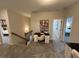 A home office with views to the bedroom, neutral walls, and a modern desk at 164 E Victory View. Ter, Smithfield, NC 27577