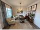 Cozy office with hardwood floors, natural light, white trim, neutral paint, and stylish decor at 164 E Victory View. Ter, Smithfield, NC 27577