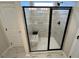 Modern bathroom features a glass enclosed shower with built-in bench at 164 E Victory View. Ter, Smithfield, NC 27577