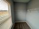 A tidy walk-in closet features wire shelving and plush carpeting at 164 E Victory View. Ter, Smithfield, NC 27577