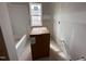 Bathroom with installed tub, drywall, and natural light from the window at 172 Royal Ave, Selma, NC 27576