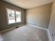 Empty bedroom featuring trim work and neutral paint with natural light at 172 Royal Ave, Selma, NC 27576