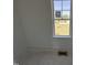 View from empty bedroom window overlooking the front yard at 172 Royal Ave, Selma, NC 27576