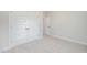 Well-lit bedroom with carpet and large closet, offering ample storage space at 172 Royal Ave, Selma, NC 27576