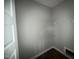 A compact laundry room with shelving offers practicality and convenience at 172 Royal Ave, Selma, NC 27576