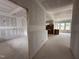 Spacious living room featuring drywall, large windows, and in-progress construction at 172 Royal Ave, Selma, NC 27576