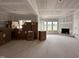 Large living room featuring fireplace, drywall, and natural light at 172 Royal Ave, Selma, NC 27576