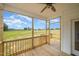 View from screen porch of large level yard at 172 Royal Ave, Selma, NC 27576