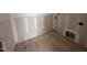 An unfinished room with new drywall and plywood flooring, ready for customization and personalization at 172 Royal Ave, Selma, NC 27576