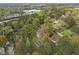 Aerial view featuring a home nestled among lush trees, offering privacy and a serene environment at 1823 E Geer St, Durham, NC 27704