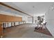 Spacious basement with concrete floors, exposed ductwork, and potential for customization at 1823 E Geer St, Durham, NC 27704
