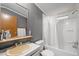 Clean bathroom featuring a tub/shower and vanity with a sink at 1823 E Geer St, Durham, NC 27704