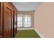 Bright bedroom featuring a closet and a large window at 1823 E Geer St, Durham, NC 27704